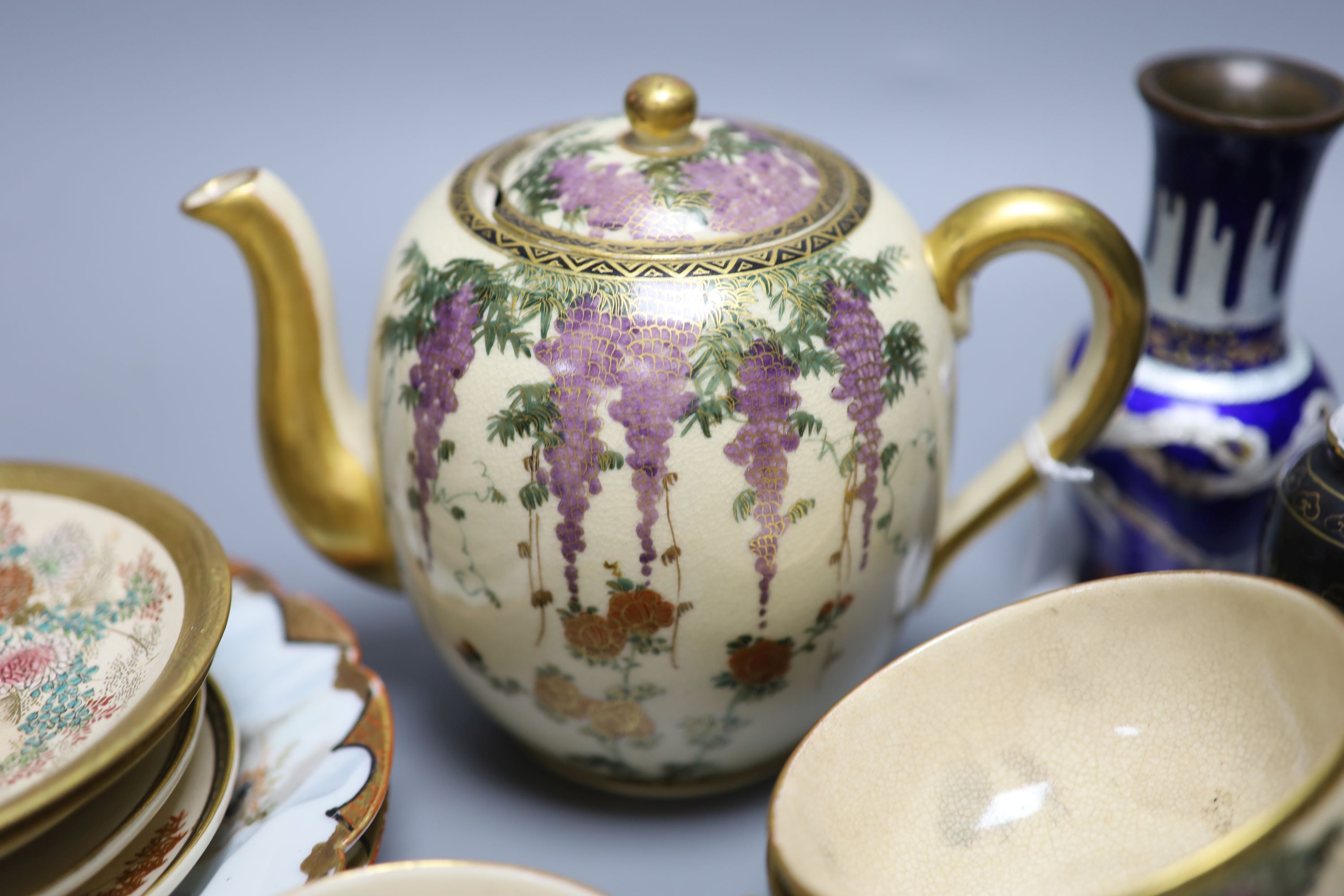 A group of Japanese cloisonne and satsuma wares
